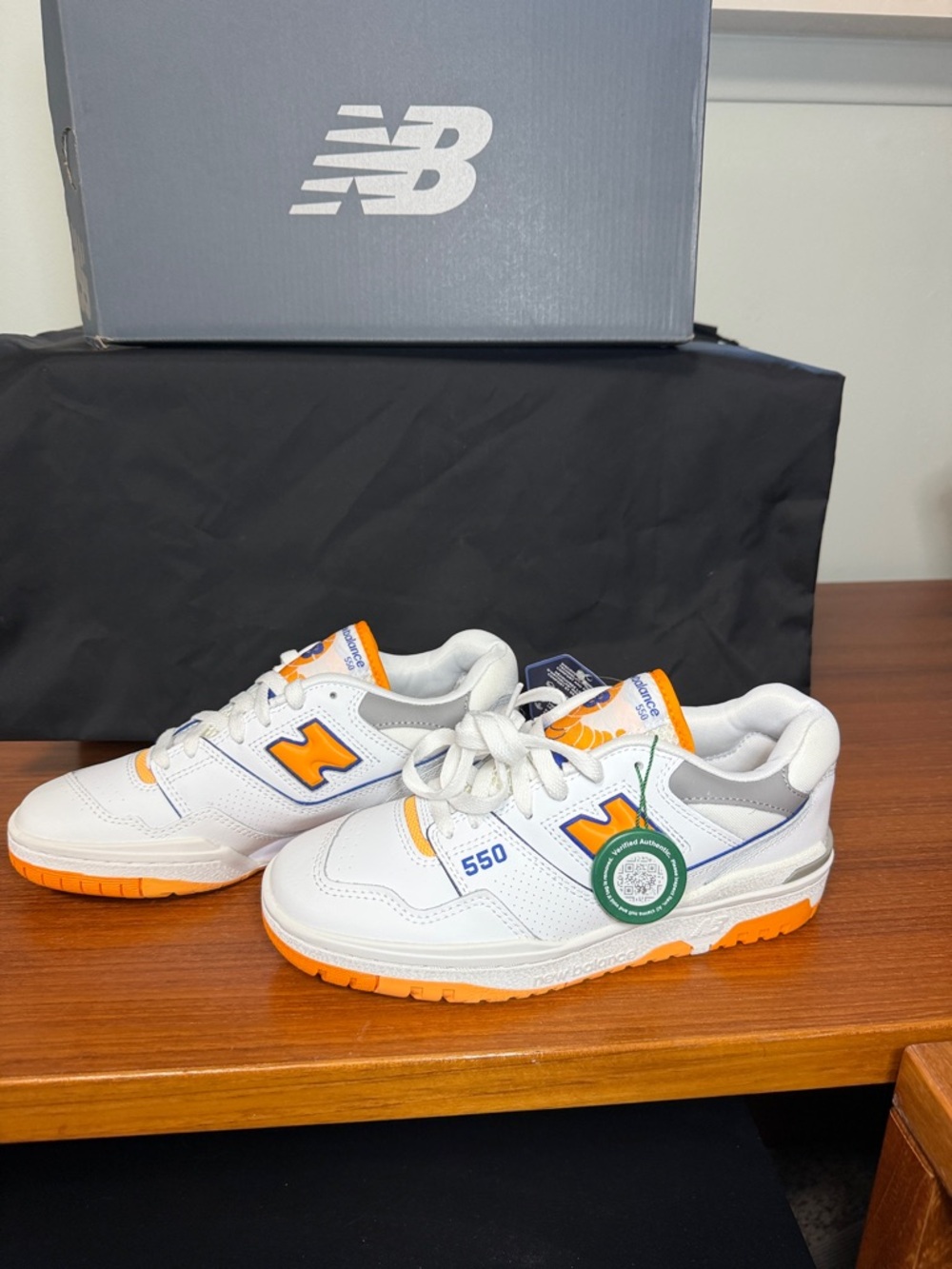 New Balance White and Orange 550 Athletic Sneakers